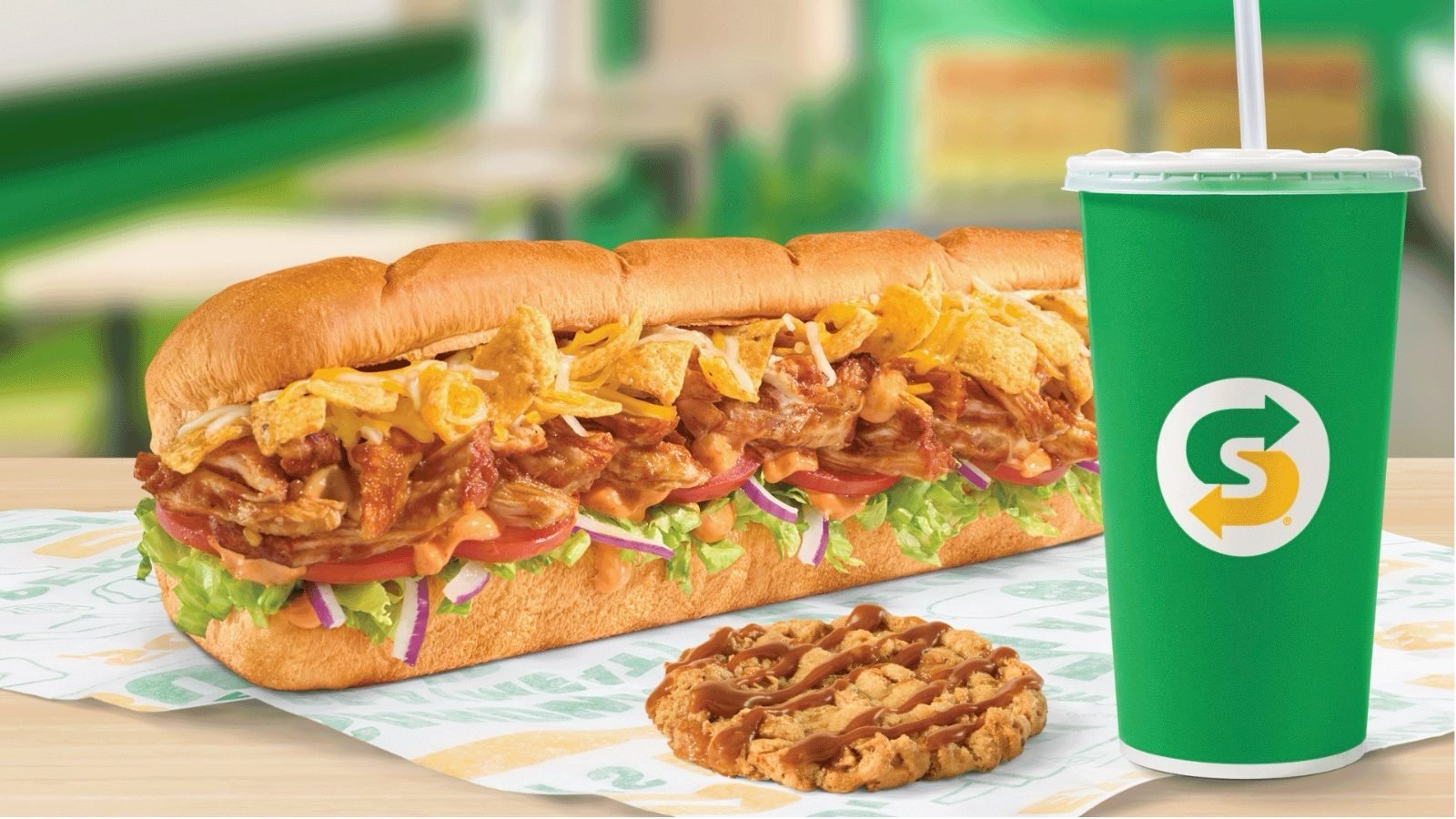 Subway Fritos Chicken Enchilada Sub topped with Fritos, with a Caramel Apple Cookie and Subway drink